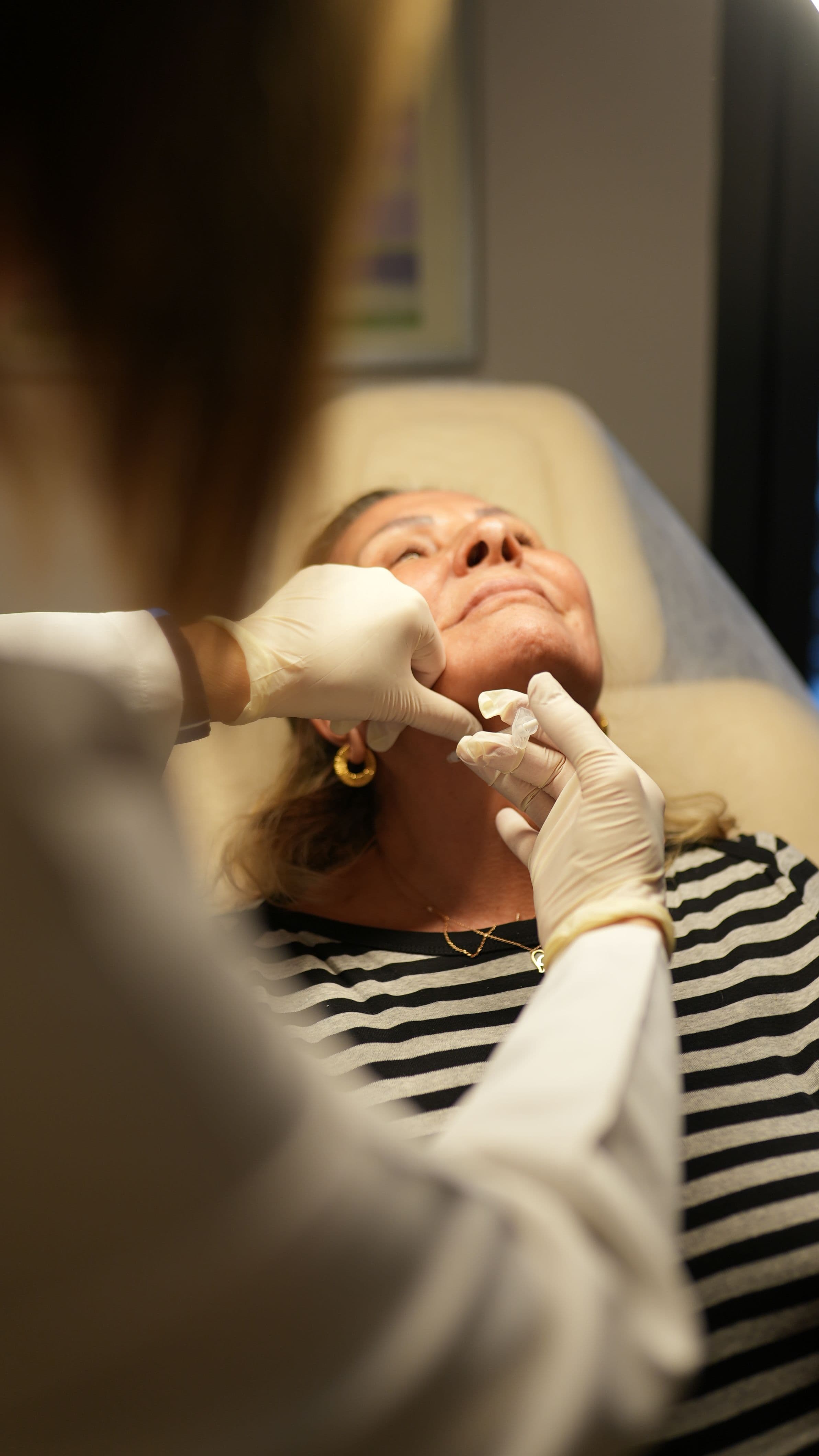 A precise, steady-handed injection technique during a consultation